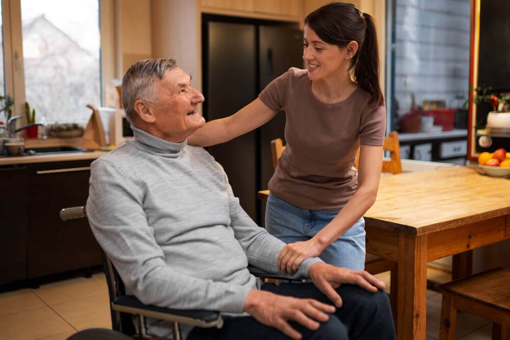 a person helping an elderly man