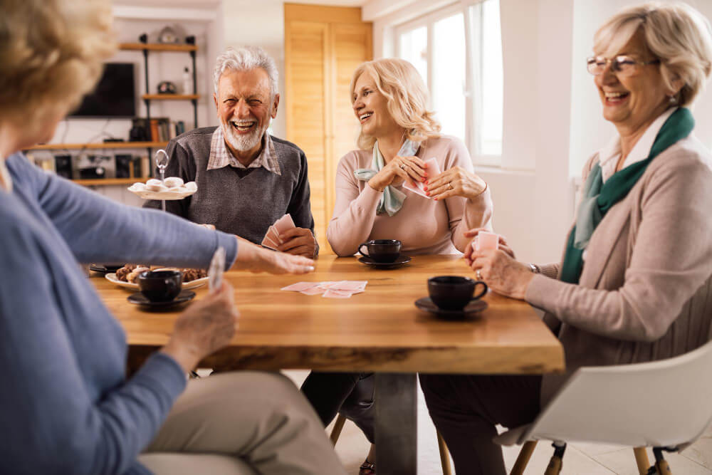 old people laughing together